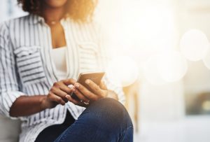 Shot of a businesswoman using technology at work